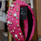 thick fuschia knotted headband with pearl and jewel detailing