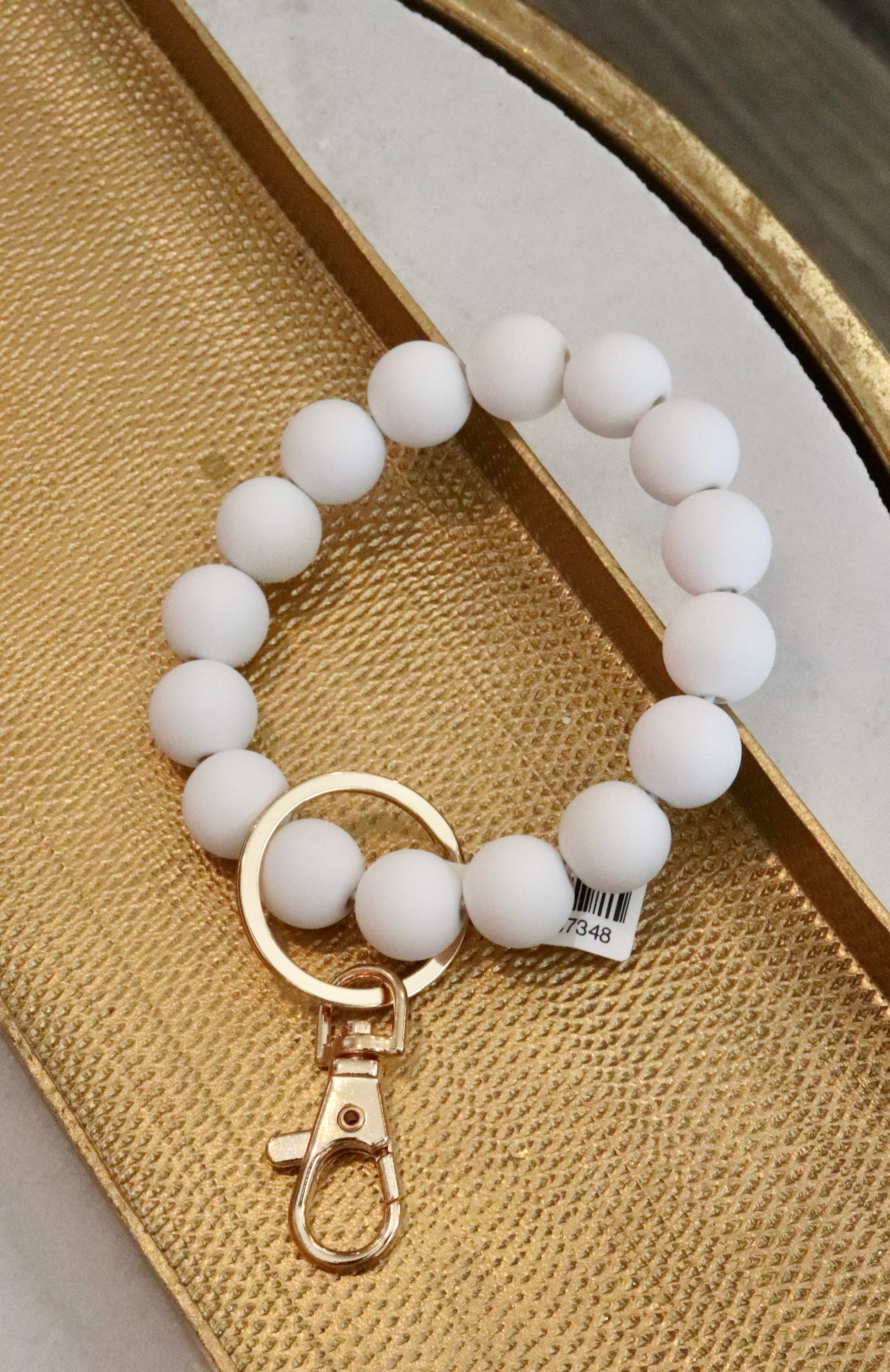 white beaded key ring