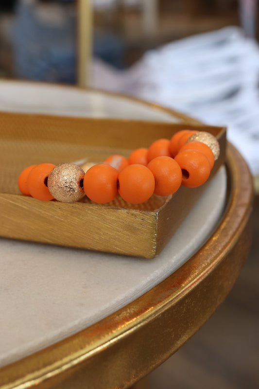 large bead bracelet with gold accent